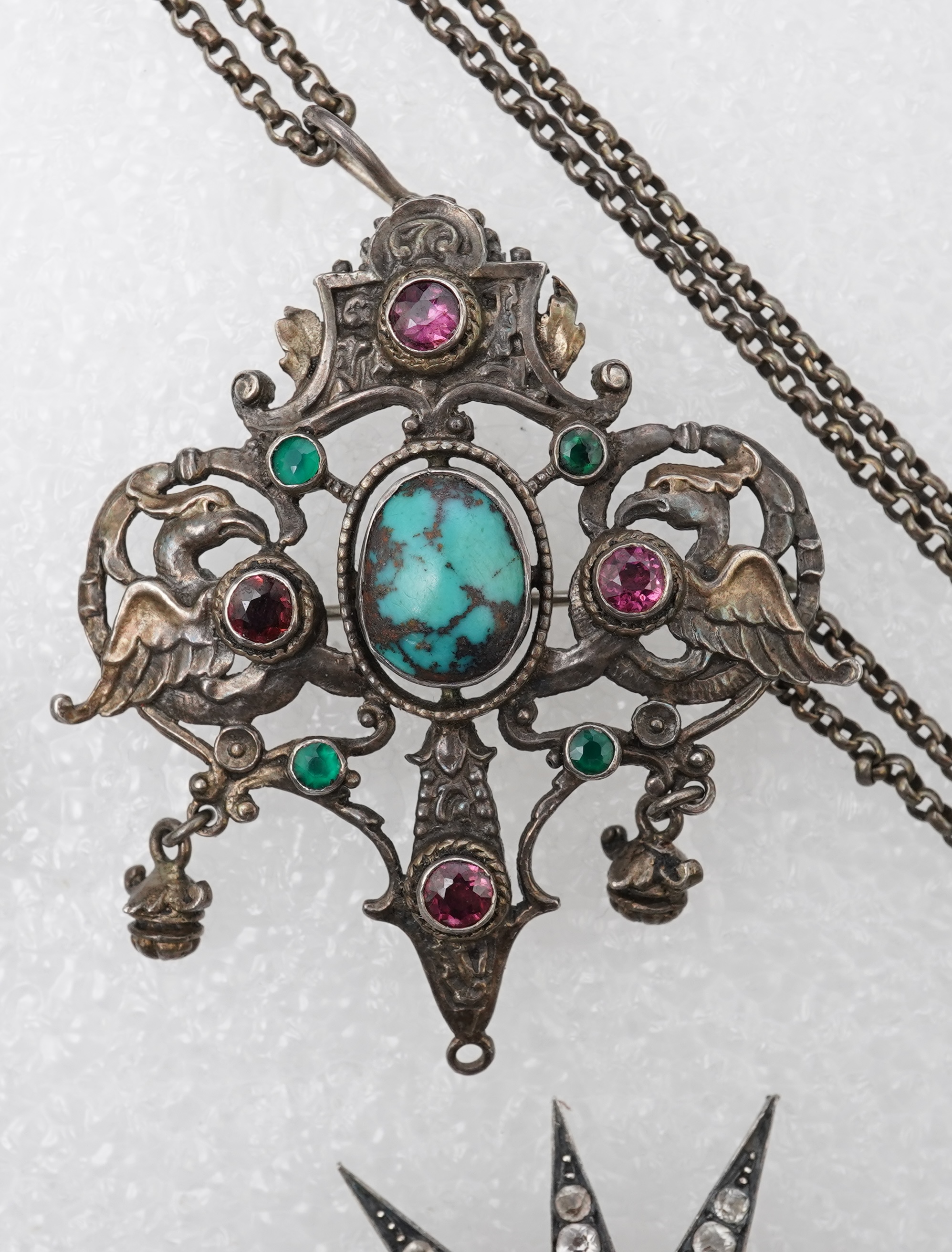 A group of jewels, comprising: a late 19th century and later Renaissance revival-style pendant set with an oval turquoise cabochon, circular-cut garnets and circular-cut green chalcedony, mounted in silver, length 6cm, s